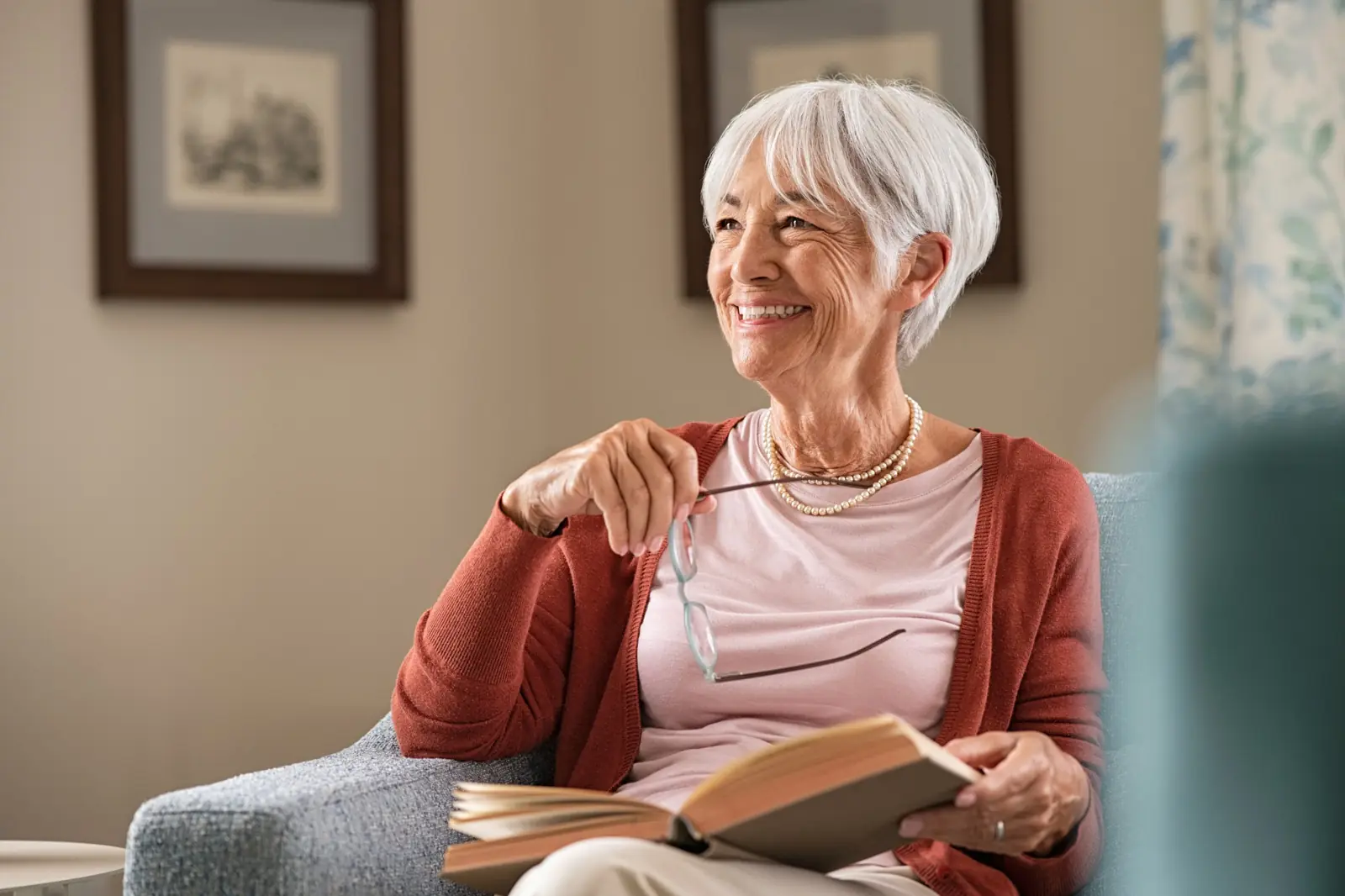 Senior woman reading at home